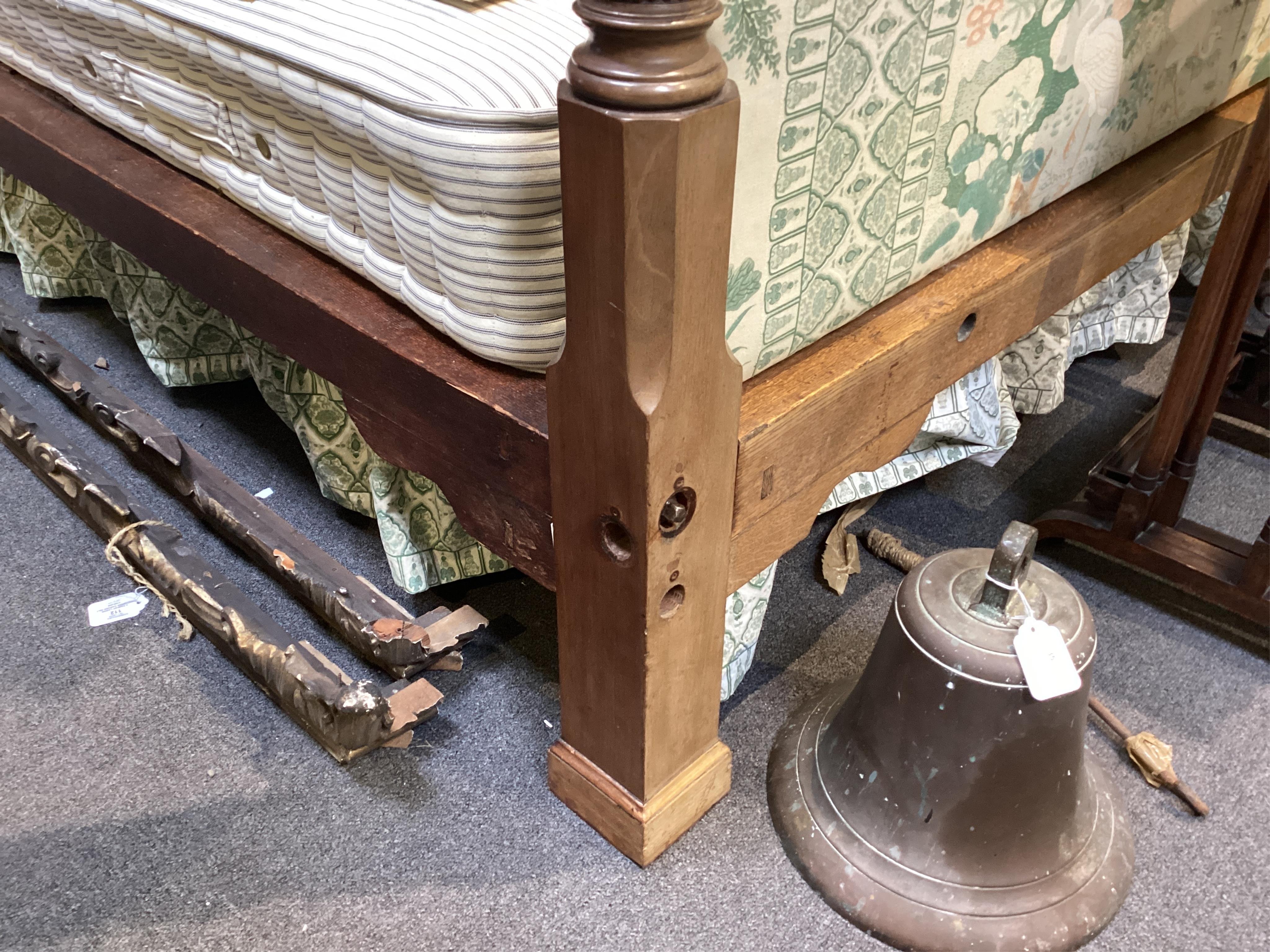 A George III style mahogany four poster bedstead